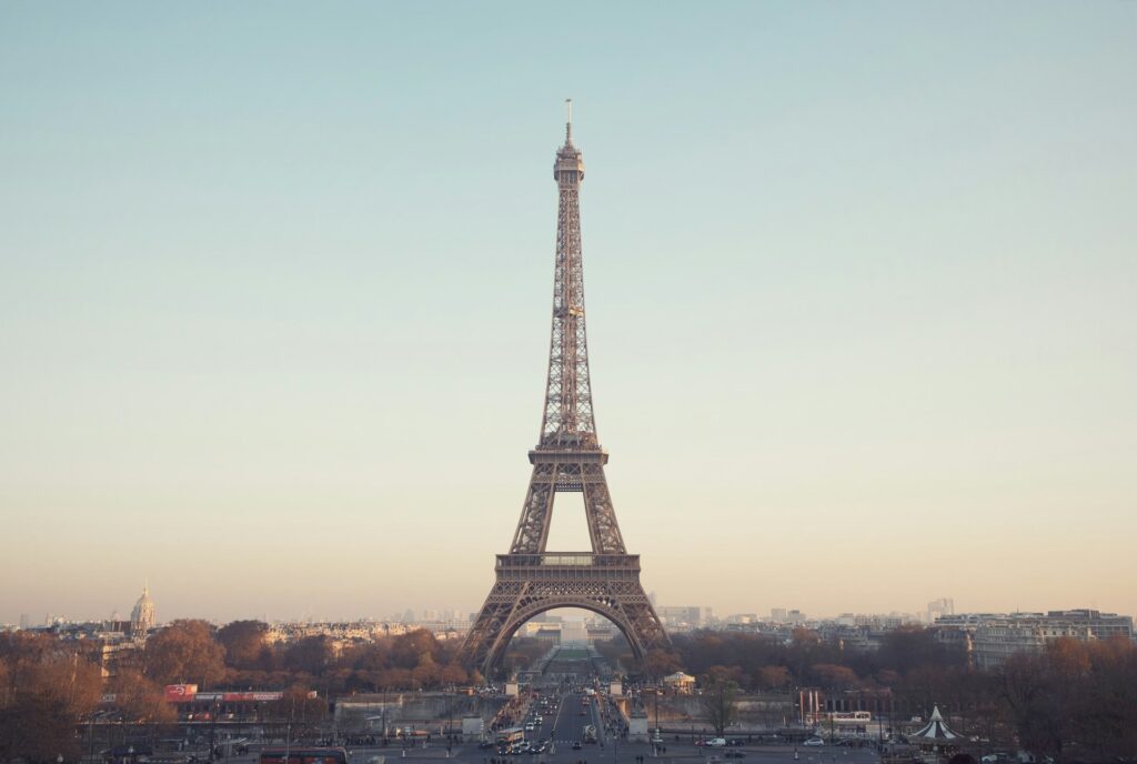 the eiffel tower in full view against a clear blue sky. showcasing one of the most well know photo spots in paris